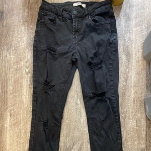 Ripped skinny jeans.